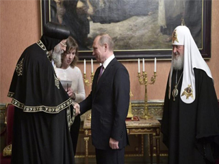 بوتين: عدد الأقباط فى العالم 30 مليونا ويعيش منهم 14 مليونا فى مصر!