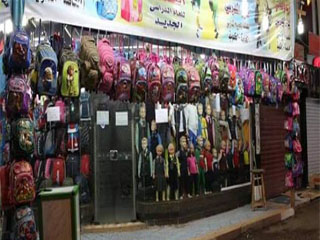 18 مليون طالب × 400 جنيه = بيزنس الزى المدرسى !