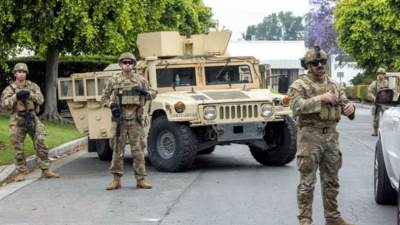 قوات المارينز تُحكم قبضتها على لوس أنجلوس تمـرد فى شوارع أمريكا صرخة المهاجرين تقابل بقمع البنادق!